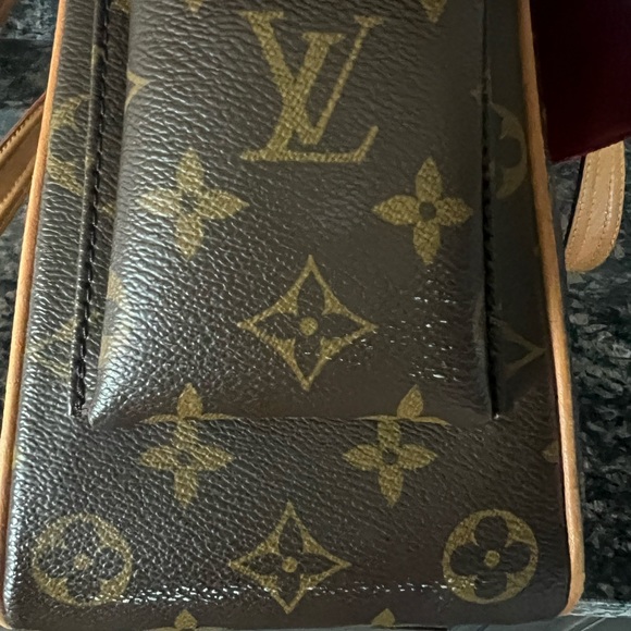 Louis Vuitton Multiplicite. Guaranteed authentic. - Picture 14 of 14